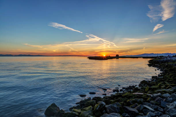 istock sunset view of seaside beach 811665666