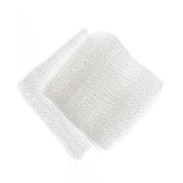 Gauze pads Sterile medical gauze pads isolated on white background gauze stock pictures, royalty-free photos & images