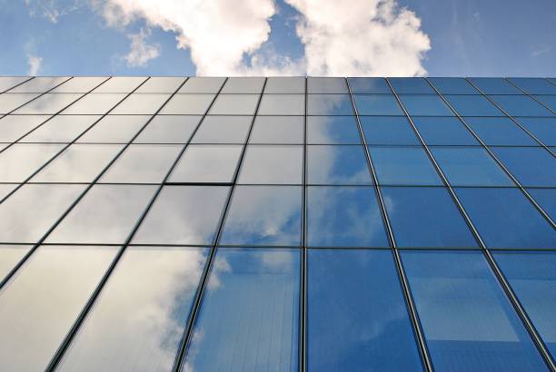 istock Modern building.Modern office building with facade of glass 811672440