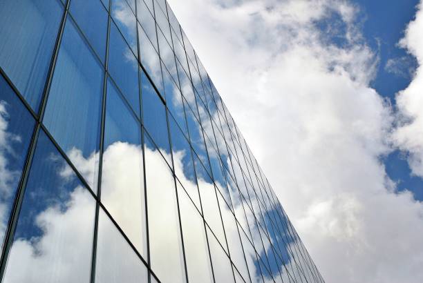 istock Modern building.Modern office building with facade of glass 811672580