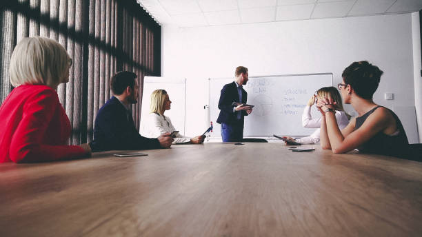 istock Business man presenting new ideas and projects to his team 811681984