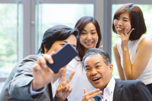 istock Business people taking a selfie picture 811696720