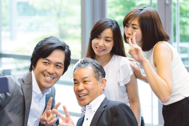 istock Business people taking a selfie picture 811699556