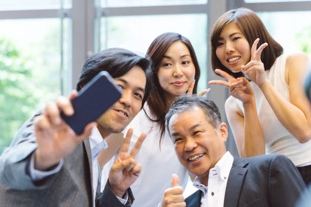 istock Business people taking a selfie picture 811706966