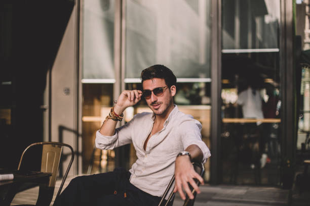 istock Portrait of a man sitting in cafe 811707008