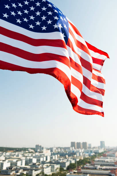 istock Waving American flag and building 811730724