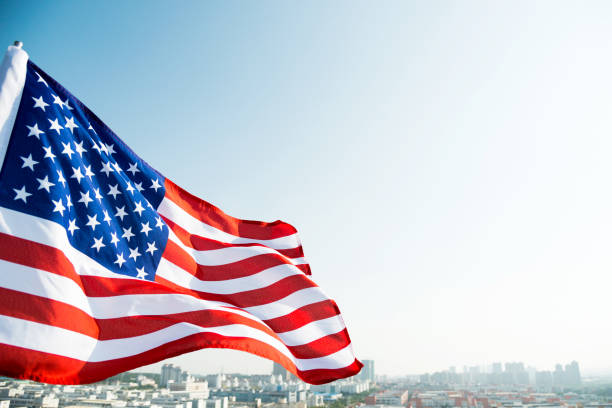 istock Waving American flag and building 811730788