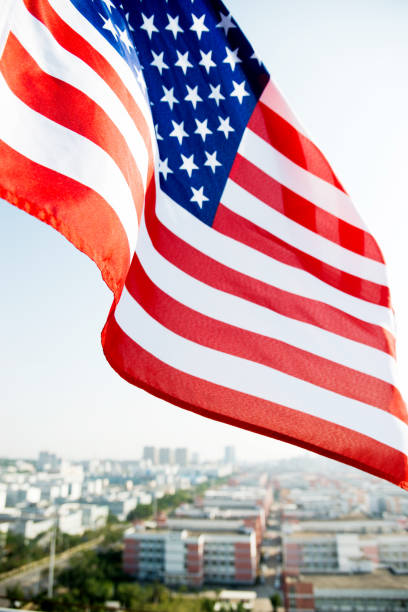 istock Waving American flag and building 811730812