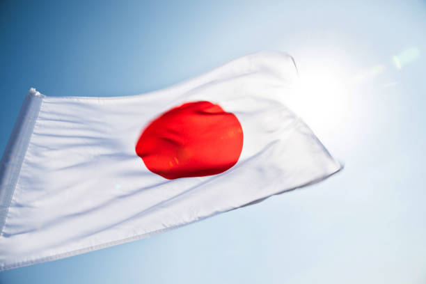 istock Flag of Japan waving in the wind 811740736
