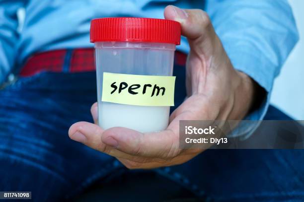 Man Hands Holding Sterile Sample Container Bottle Stock Photo - Download Image Now - Adult, Analyzing, Bottle