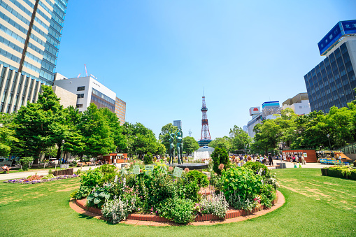 Sapporo, Japan -  June 30, 2017 - Television tower at Odori Park, Sapporo, Hokkaido, Japan.Odori Park is a park located in the heart of Sapporo.The Sapporo TV Tower built in 1957.