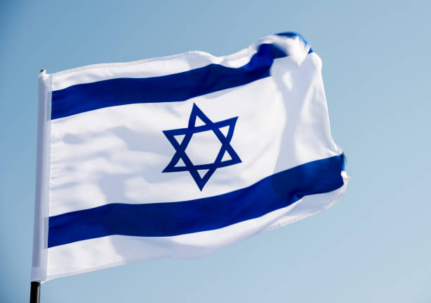 istock Israel's national flag in the wind 811752786