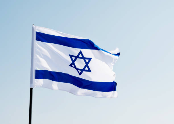 istock Israel's national flag in the wind 811752798