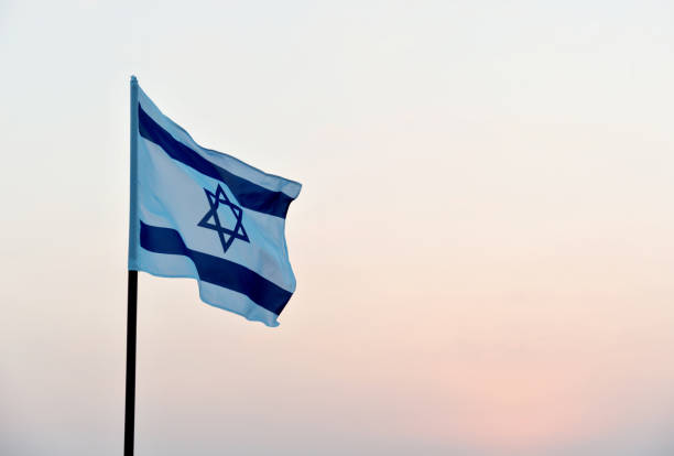 istock Israel's national flag in the wind 811752830