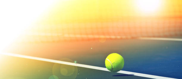 Tennis balls are falling ground.