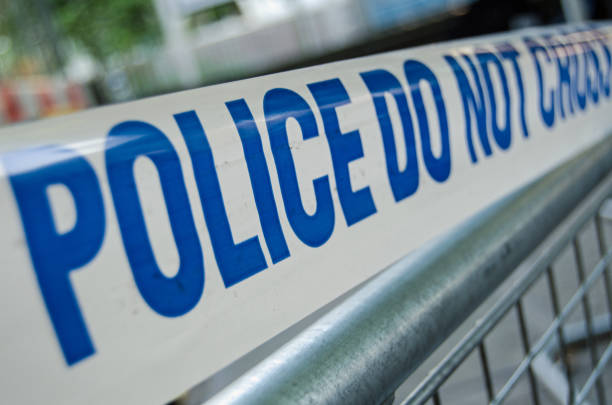 istock Police barrier tape 811770026
