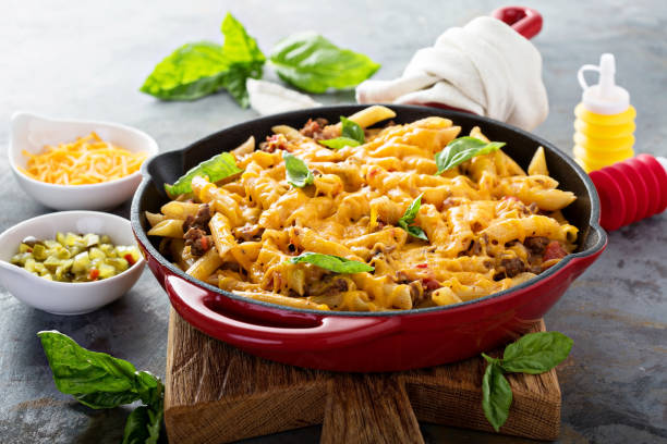 istock Cheesy pasta bake with ground beef and herbs 811790200