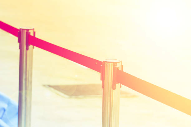 istock The fence pole with attached red ropes 811808084
