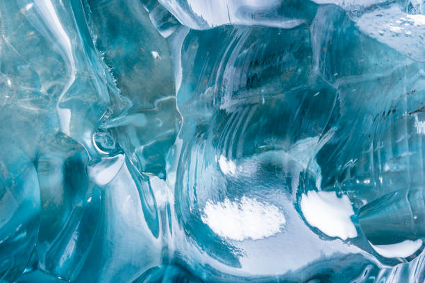 istock blue ice texture background in the ice cave in Iceland. 811827838