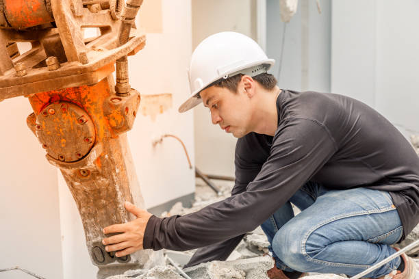 istock Asian man check Backhoe Robot Equipment on construction zone. 811827870