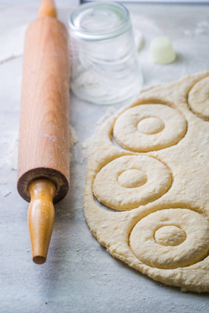 istock Traditionally and delicious donuts making from fresh dough 811830302