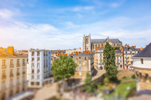 Beautiful cityscape view with saint Pierre cathedral and castle walls in Nantes city during the sunny day in France