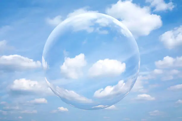 Sphere in the blue sky with white cloud.
