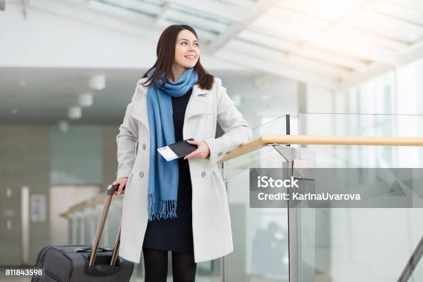 Airport Business Woman With Smart Phone At Gate Waiting In Terminal Stock Photo - Download Image Now