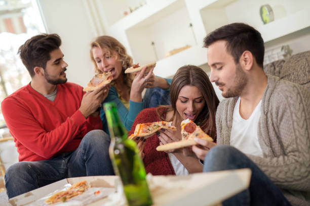 istock Friends having fun at home 811844338