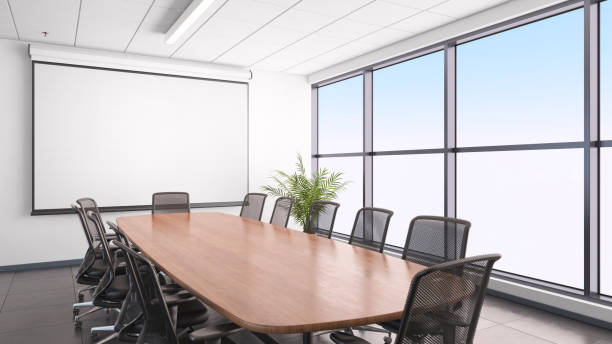 istock Business office interior, conference desk and projection screen 811846568