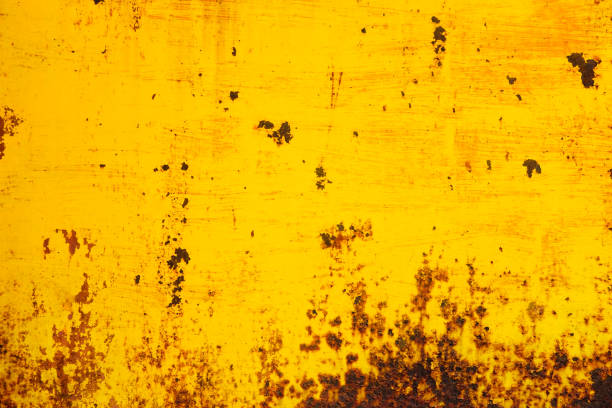 istock Rusted yellow painted metal. Abstract texture matal background. 811850056