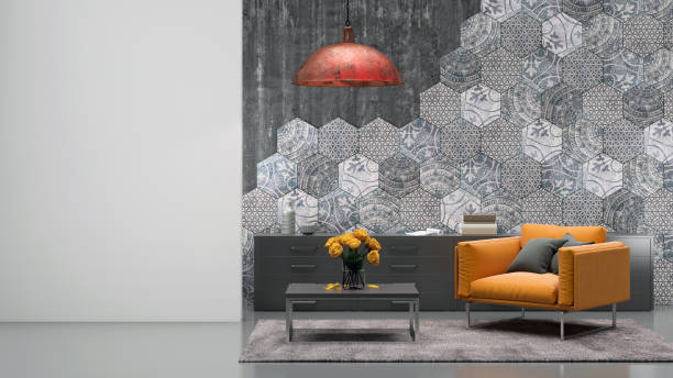 Living room interior with orange armchair Living room interior with vibrant orange armchair, carpet, coffee table with flowers, hexagonal tiles on the wall, pendant light above, decorative ornate design. blank white wall for copy space artist template hexagon photos stock pictures, royalty-free photos & images