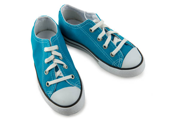 istock Blue children's sneakers isolated on a white 811853272