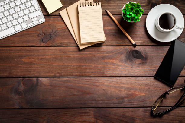 istock Wooden desktop shot from above 811864316