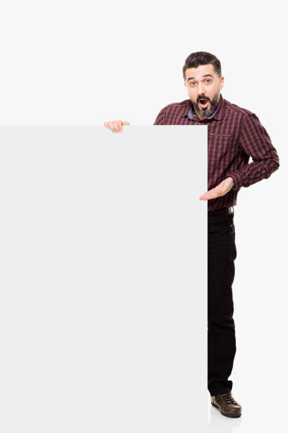 istock Young man with blank sign 811866952