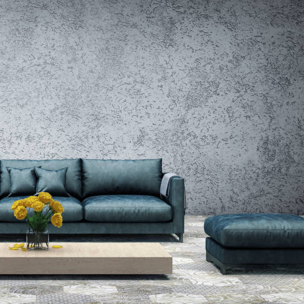 Interior with pastel green colored sofa with blank wall