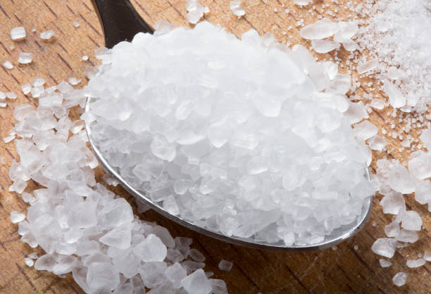 istock sea salt in spoon 811875000