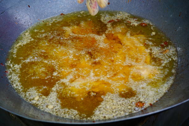 istock Frying pork and Oil in pan 811886618