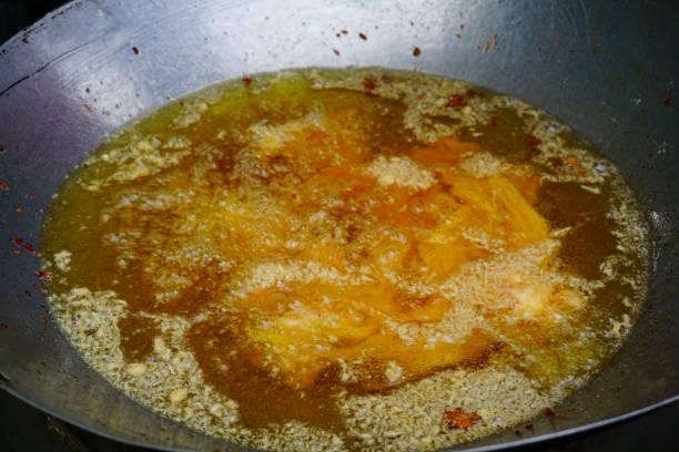 istock Frying pork and Oil in pan 811887840