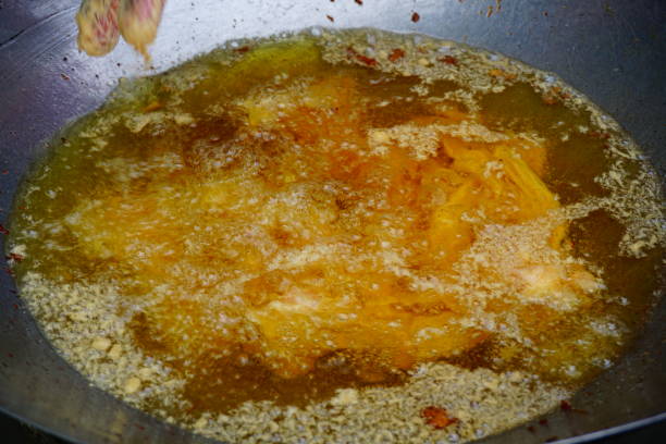 istock Frying pork and Oil in pan 811887930