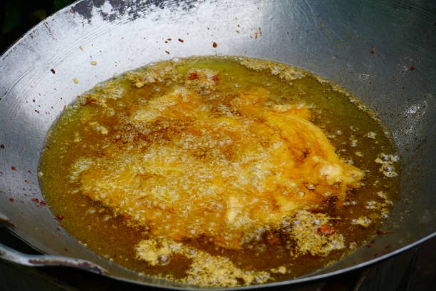 istock Frying pork and Oil in pan 811887966