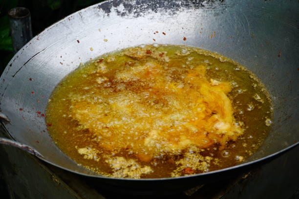 istock Frying pork and Oil in pan 811887968