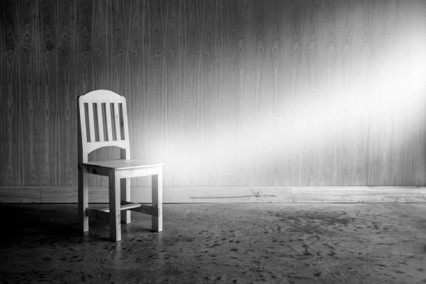 istock wooden chair alone 811911424