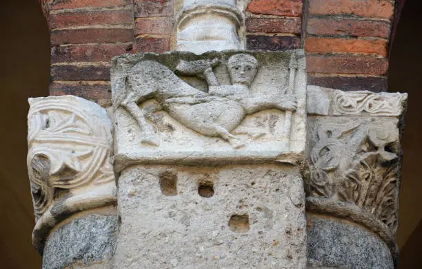 Stonecarving decor on the column in Basilica St Ambrogio - Centaur