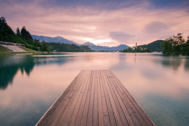istock Wooden deck leading into Bled lake,Slovenia 811943460