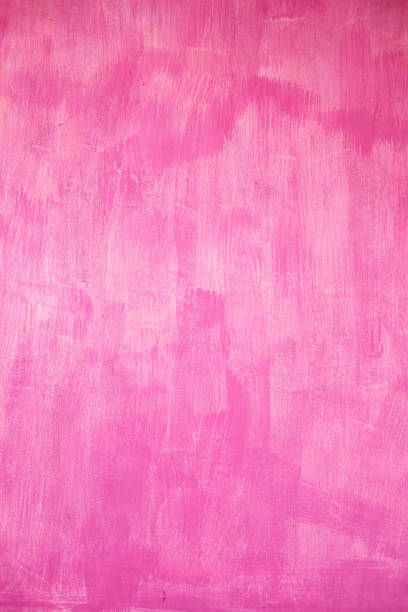 istock Pink background painted wall. Marks from the brush. 811950694