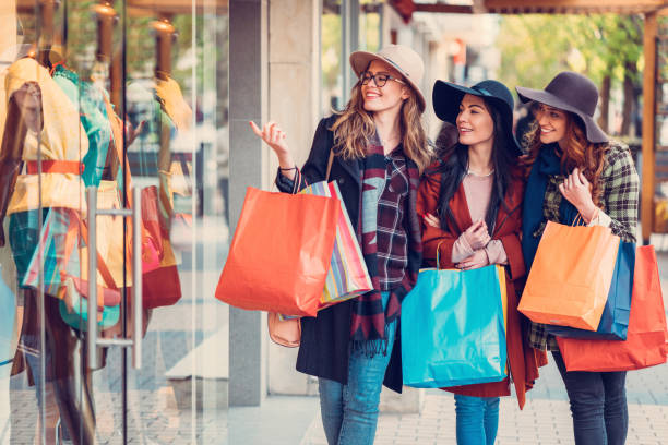 istock Young women enjoying a window shopping 811953336