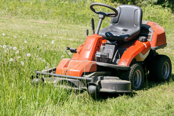 istock red lawn mower on green grass lawn in sunny day 811955904