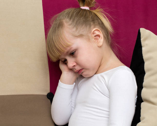 istock little blond girl is crying 811967794