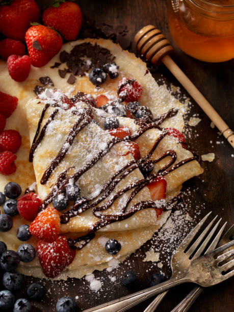 istock Crepes with Chocolate Sauce and Powdered Sugar 811988110